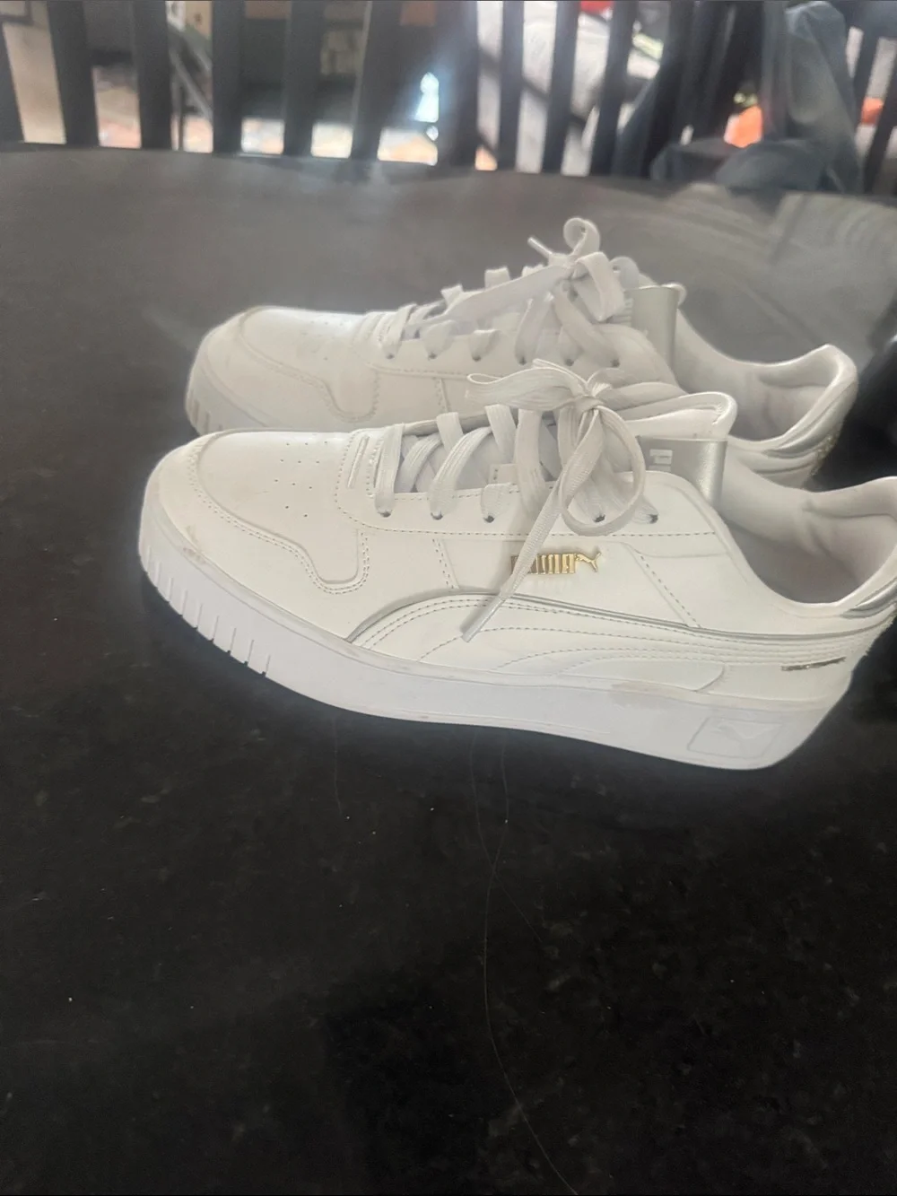 Puma Women’s White Sneakers with Gold Heel Accent